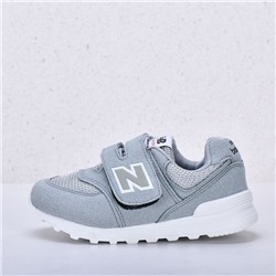 Детские кроссовки New Balance 574 цвет серый 1250